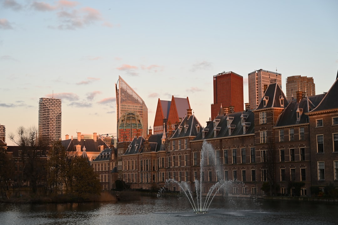 A large building with a fountain in front of it